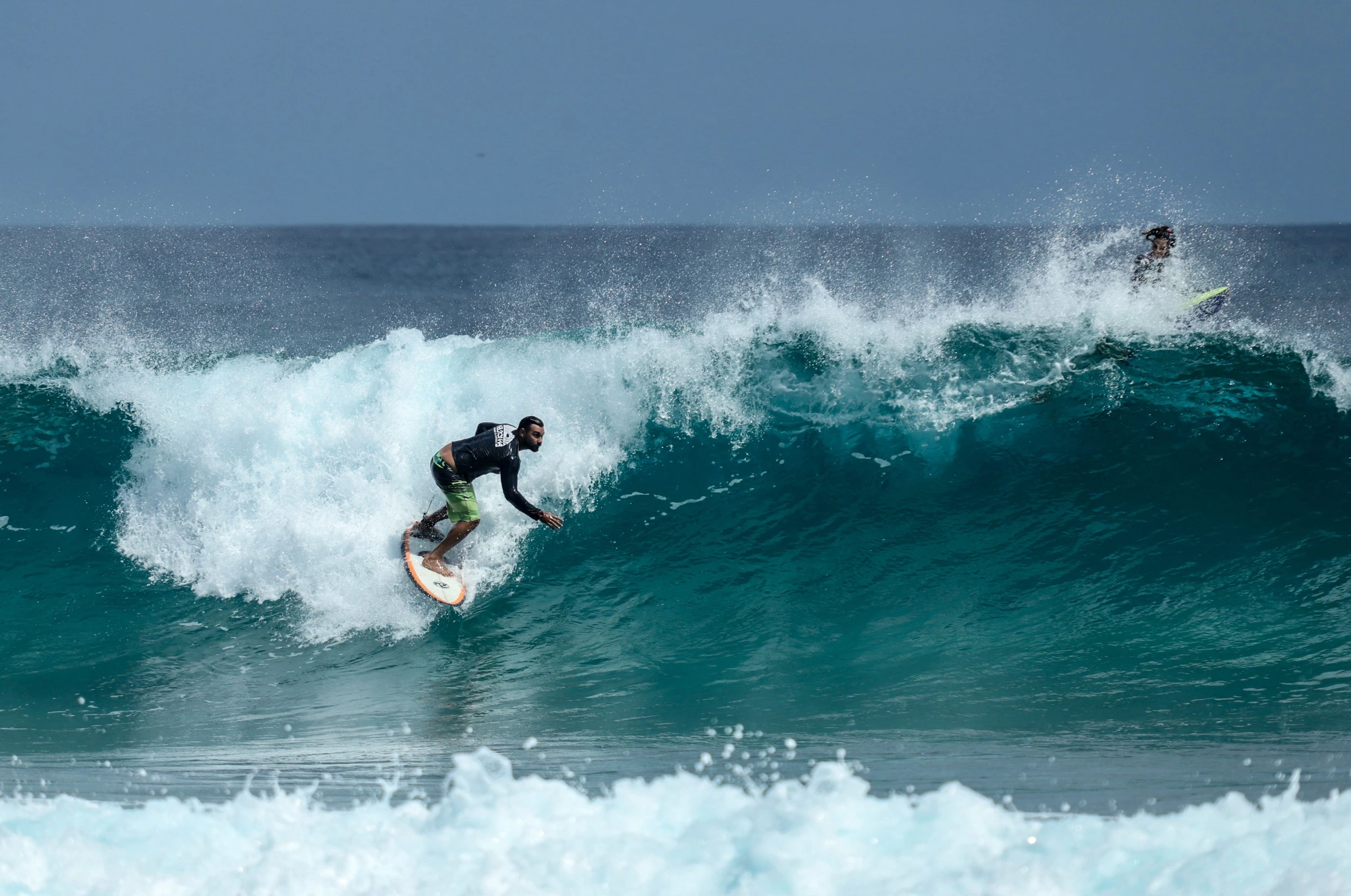 Surfer riding a wave